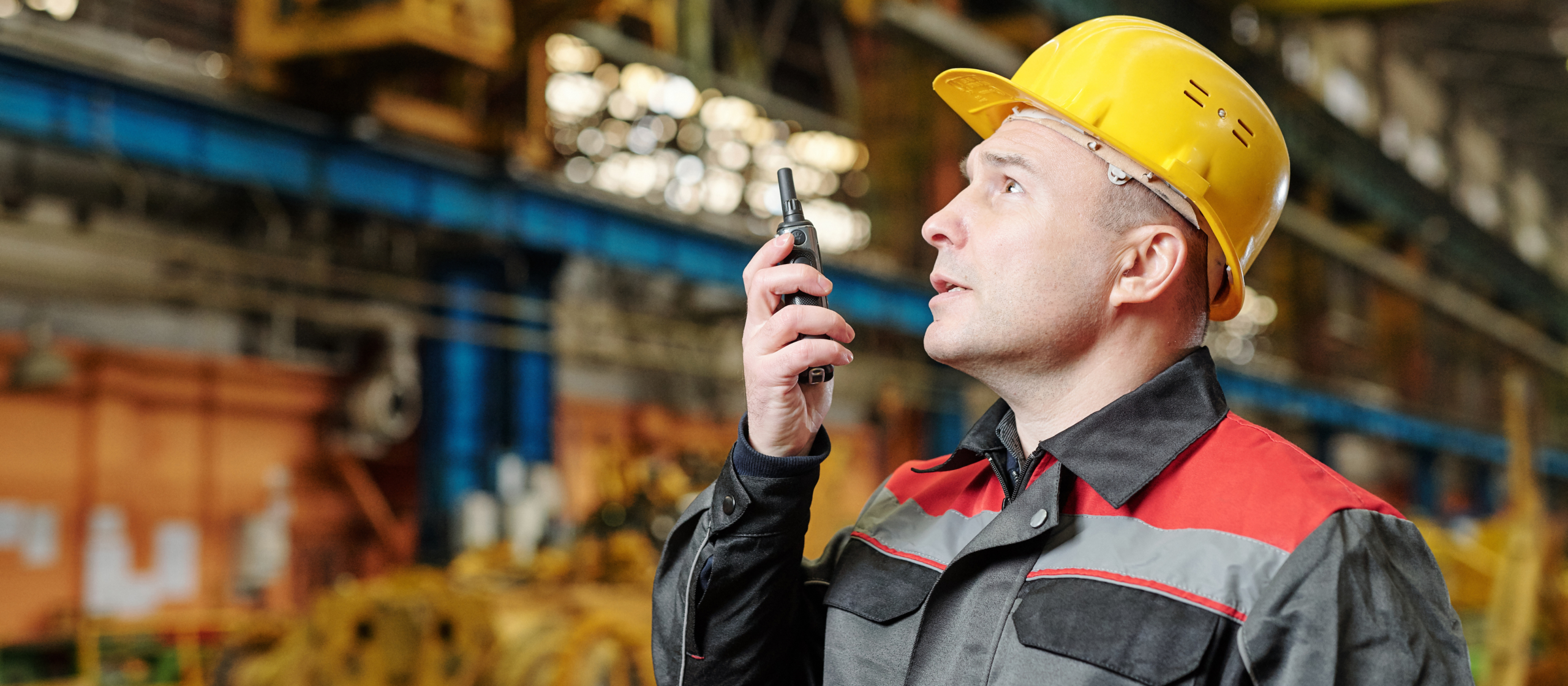 Worker using a walkie talkie 981858 scaled