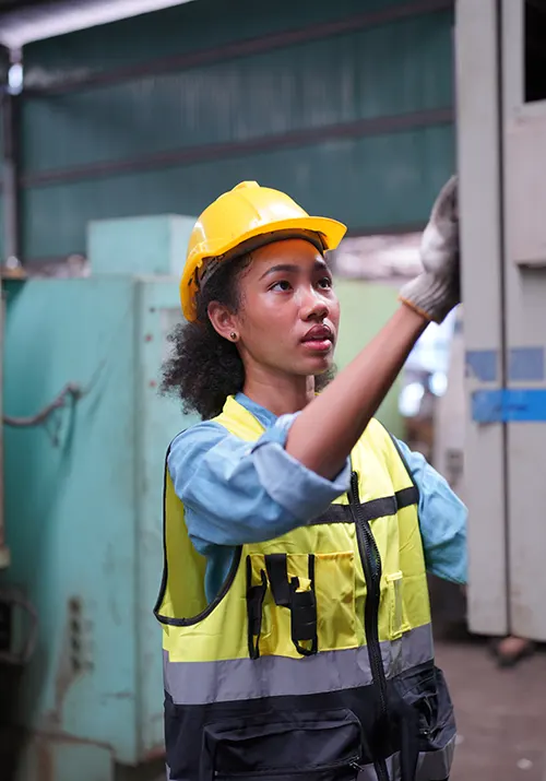 industrial factory employee working in metal manuf